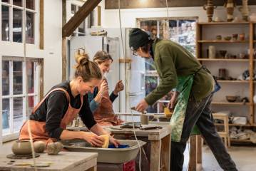 Wheel throwing pottery experience