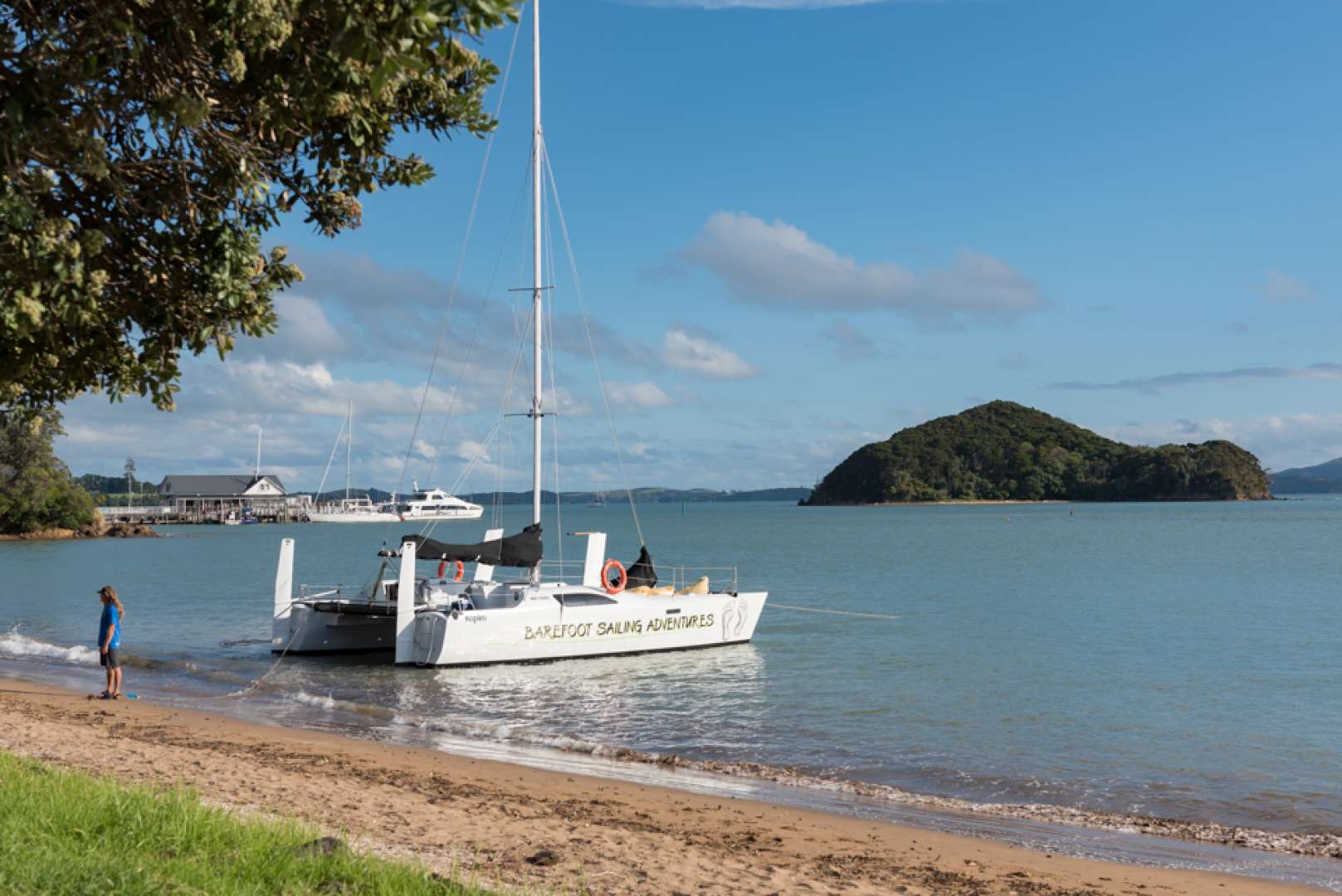 Climbing Aboard Yacht Trip for the Bay of Islands Evening Cruise atPaihia Beach