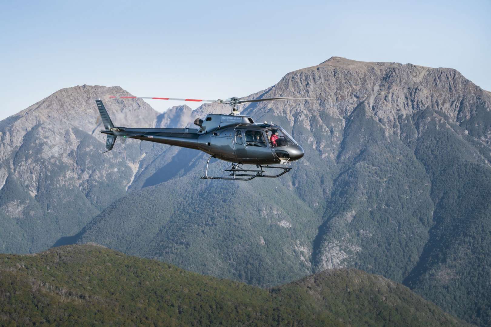 Fly Over Farmland and Forested Valleys into Nelson�s Remote Mountain Ranges