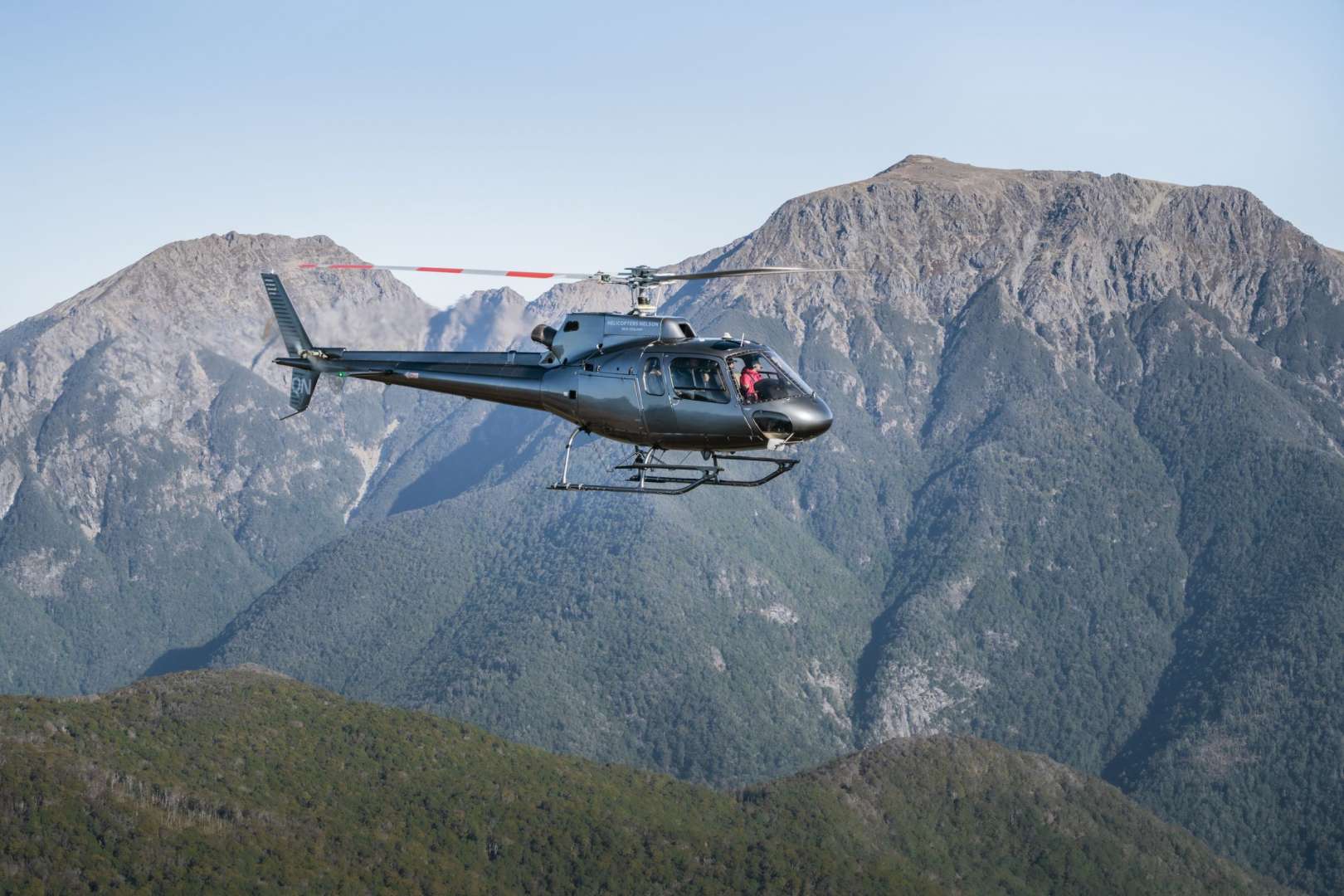 Fly Over Farmland and Forested Valleys into Nelsons Remote Mountain Ranges