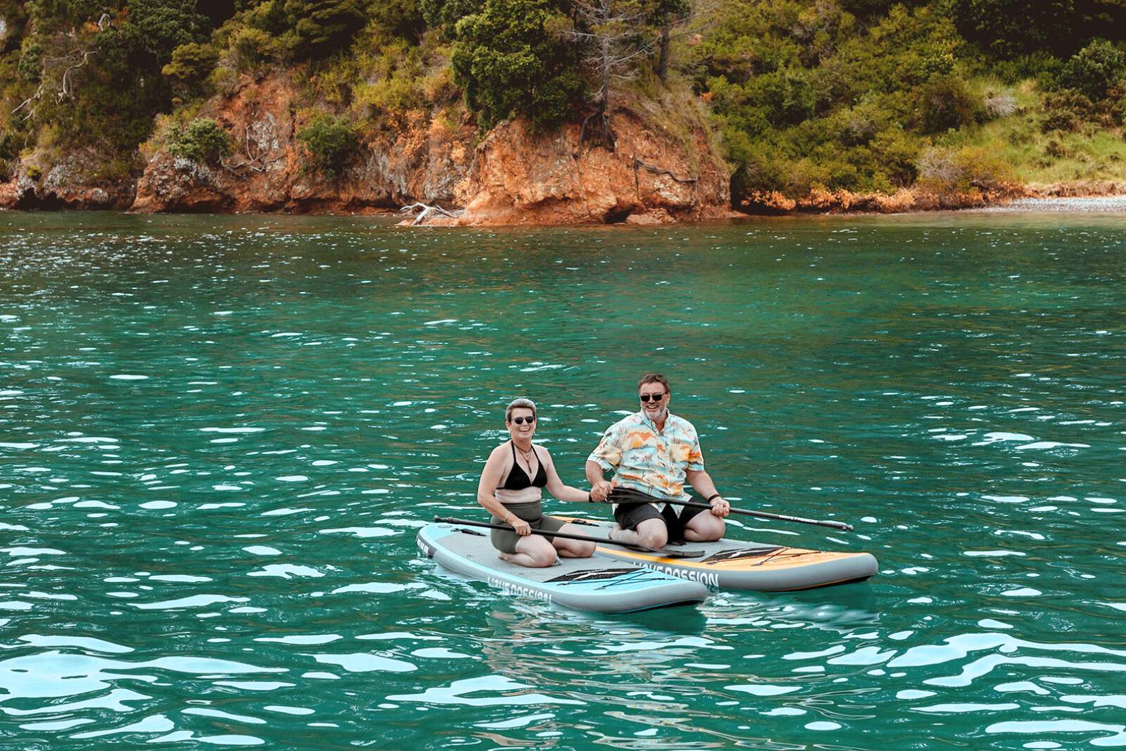 Silverwave Yacht Charter uests on paddleboards