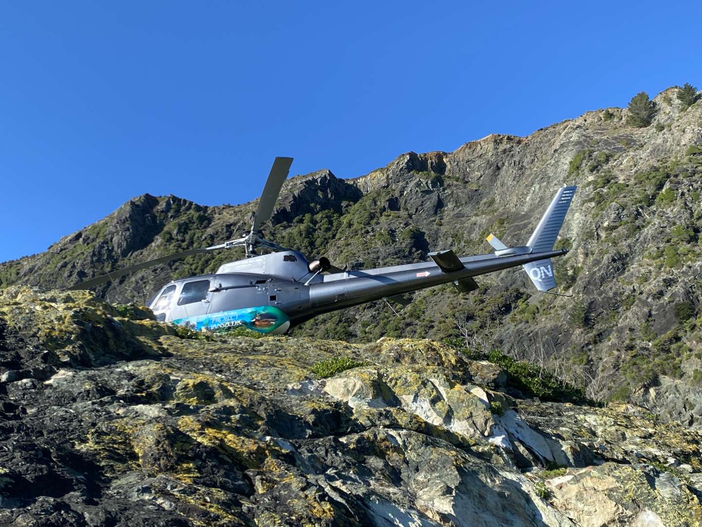 Helicopter Landing on Rocks for Heli Fishing