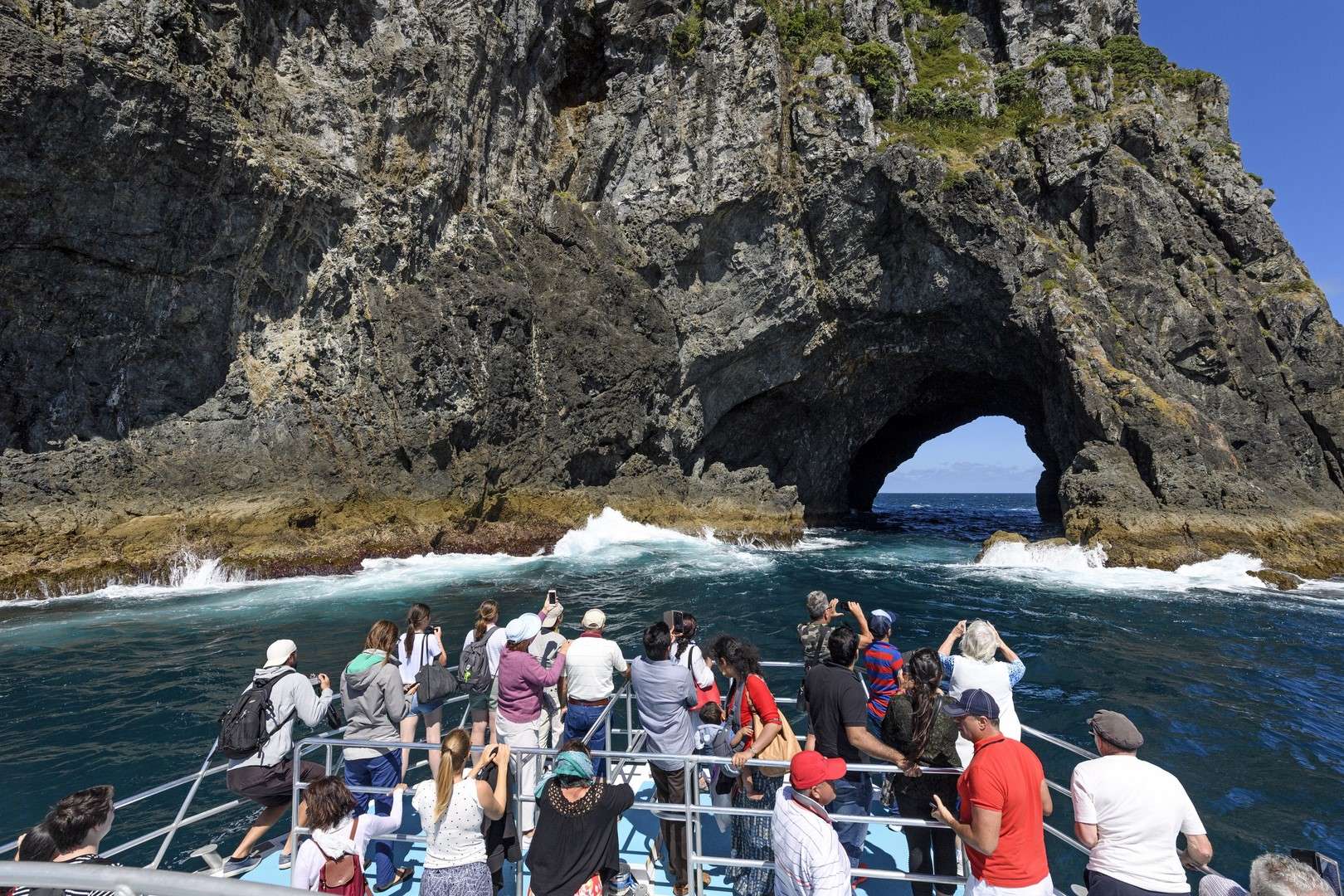 Hole in the Rock boat trip going through the rock!