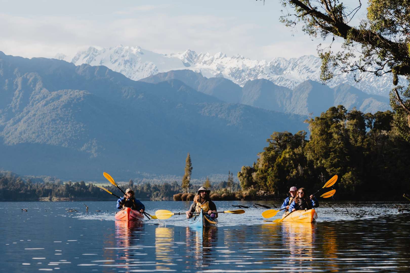 Kayak beneath the Southern Alps and glaciers.