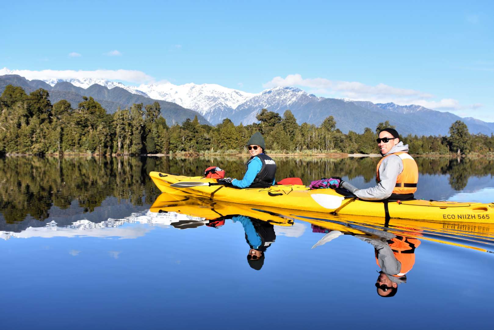Kayak in Glassy water and mountain views