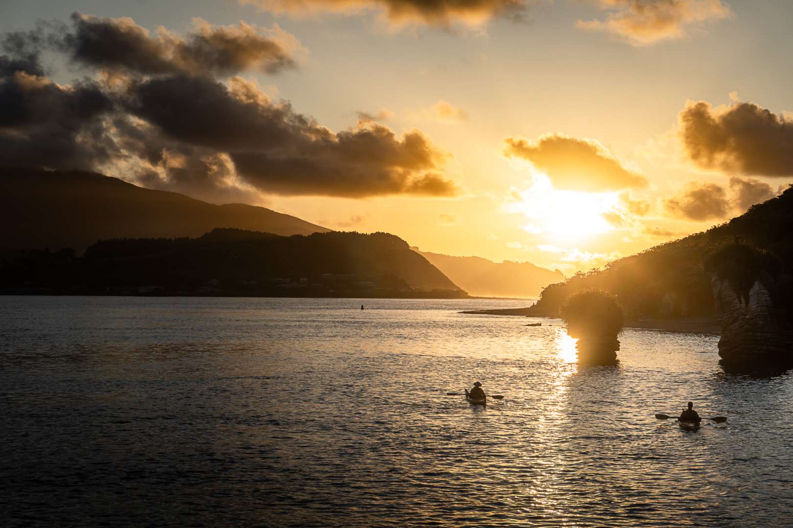 Kayaking in Whaingaroa harbour