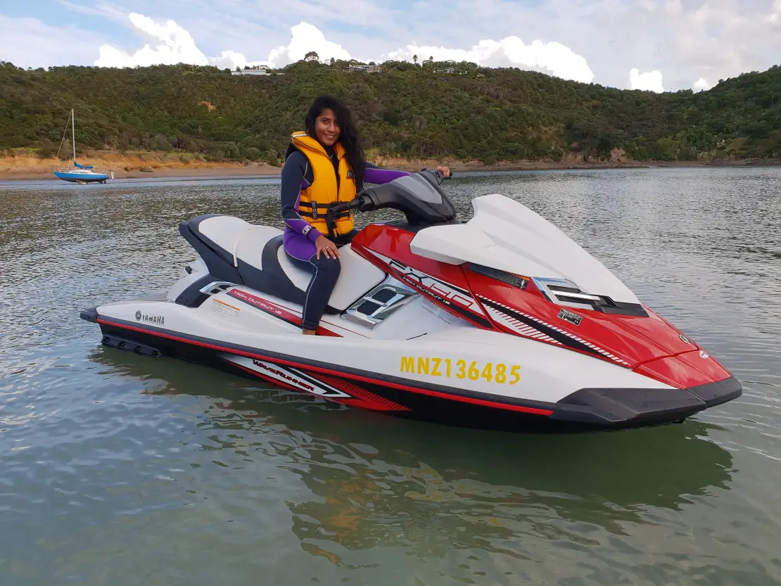 Lady on a jetski showing the size of the Jetski