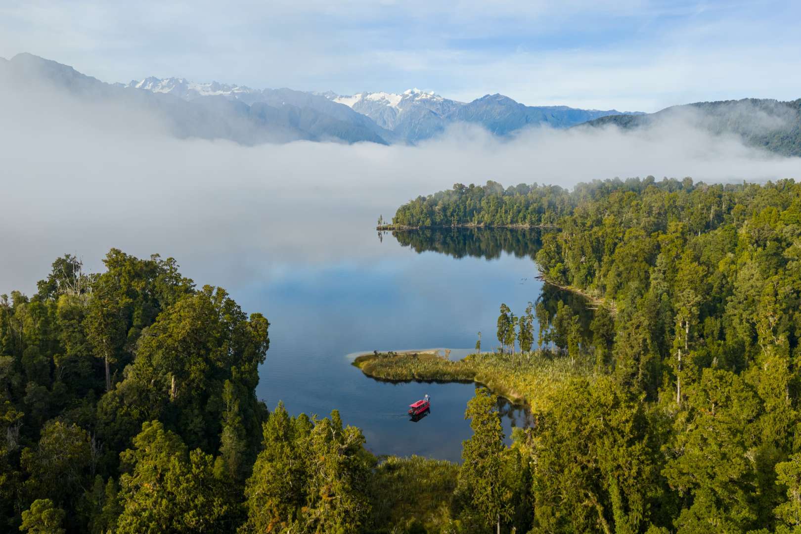 Cruise across pristine tannin-filled water with uninterrupted views of Franz Josef Glacier