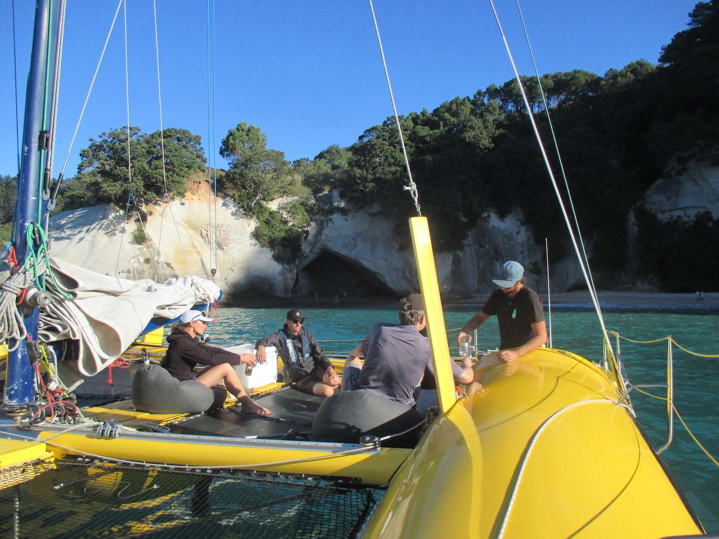 Our crew pours a drink for guests parked infront of Cathedral Cove