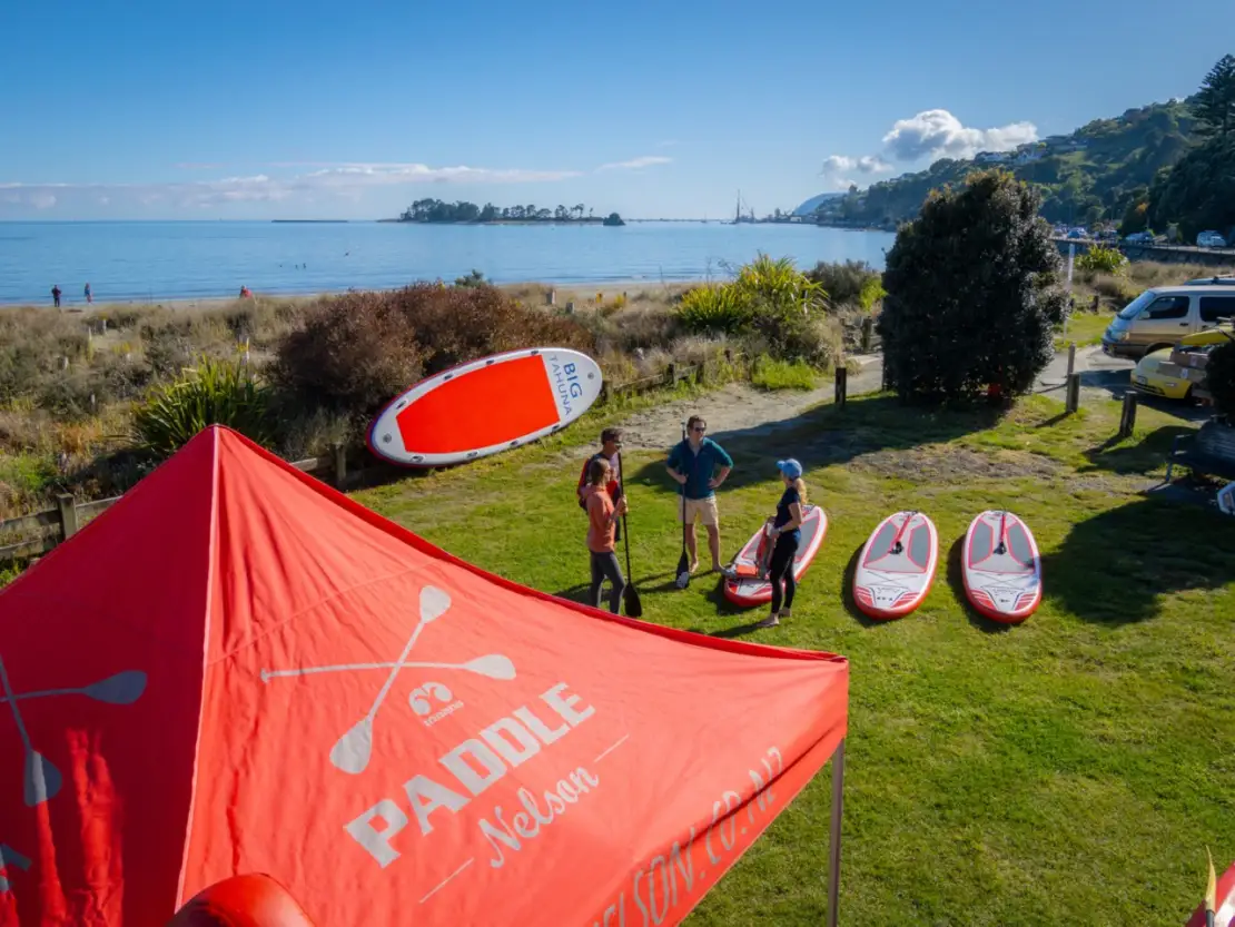 Pick up your board from Tahunanui beach!