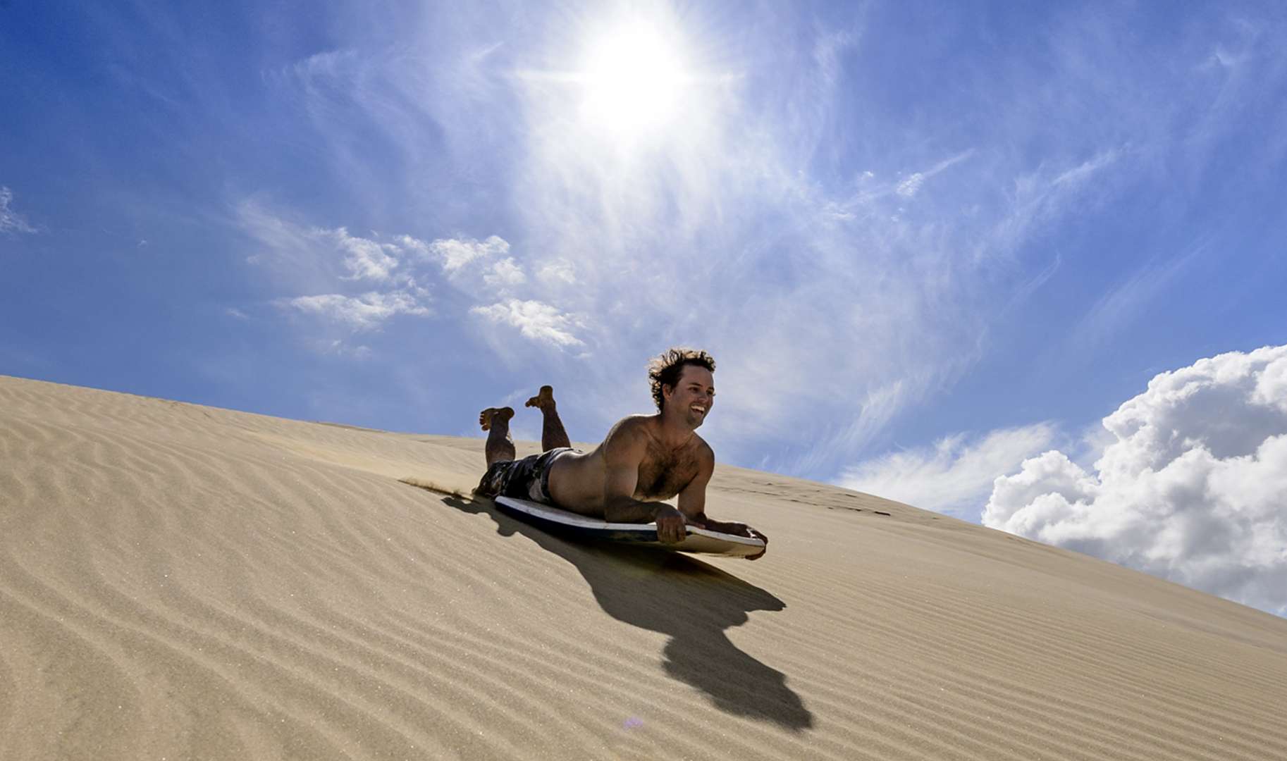 Sandboarding at 90 Mile Beach