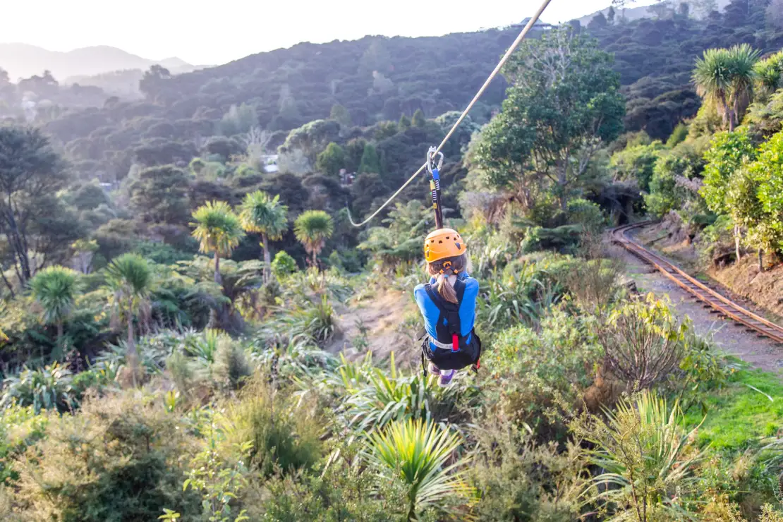 Zipliner going taking off on the 200 metre zipline next to the railway